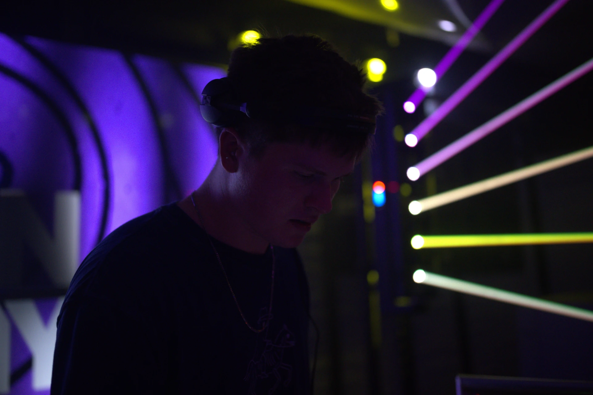 Wide studio session portrait of Jason Kushy, Monterey based house producer